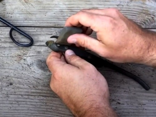 claeaning a curved bonsai tool